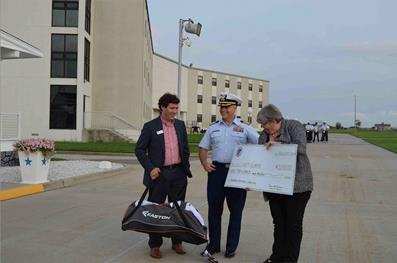 Macintosh HD:Users:wrushtongrahamii:Desktop:Cape May Sunset Parade:Coast Guard Foundation's Brengle & Sisley presenting Check to Cape May commandant LR PRG.jpg