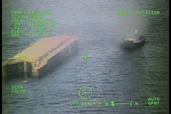 The tugboat Thomas Dann burns after a fire broke out Friday 8 miles east of Matanzas. A good Samaritan recovered the six crewmembers from a life raft. U.S. Coast Guard photo courtesy Air Station Clearwater.