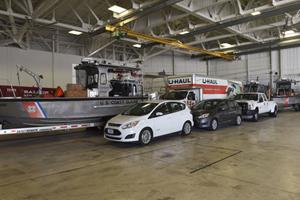 Coast Guard vehicles are stored inside the hangar at Air Station Miami before Hurricane Irma makes landfall, Sept. 8, 2017. U.S. Coast Guard photo by Petty Officer 1st Class Mark Barney. 