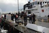 Customs and Border Protection employees depart the Coast Guard Cutter Heriberto Hernandez after arriving in San Juan, Puerto Rico in preparation of reconstitution and recovery efforts in the U.S. Virgin Islands due to Hurricane Maria Sunday, Sept. 17, 2017.