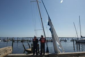 Hewlett assess damage to a vessel in Jacksonville, Florida caused by Hurricane Irma, Sept. 13, 2017. 