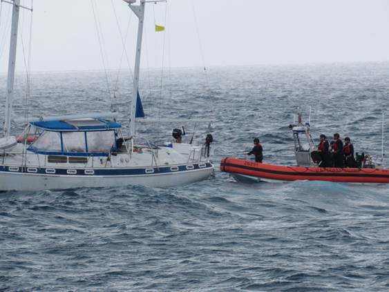 The Coast Guard Cutter Heriberto Hernandez’s Over the Horizon IV cutter boat renders assistance to the disabled sailing vessel Wahu Jan. 14, 2021, approximately nine nautical miles west of Cabo Rojo, Puerto Rico. The Coast Guard later terminated the voyage for the vessel Wahu following a post search and rescue boarding of the vessel, which revealed multiple safey violations. The Wahu was transiting with two people onboard from Florida to Barbados when it reportedly became disabled. Once the operator of the vessel Wahu completes repairs and corrects the cited violations, the vessel will be able to resume its voyage. (U.S. Coast Guard photo)